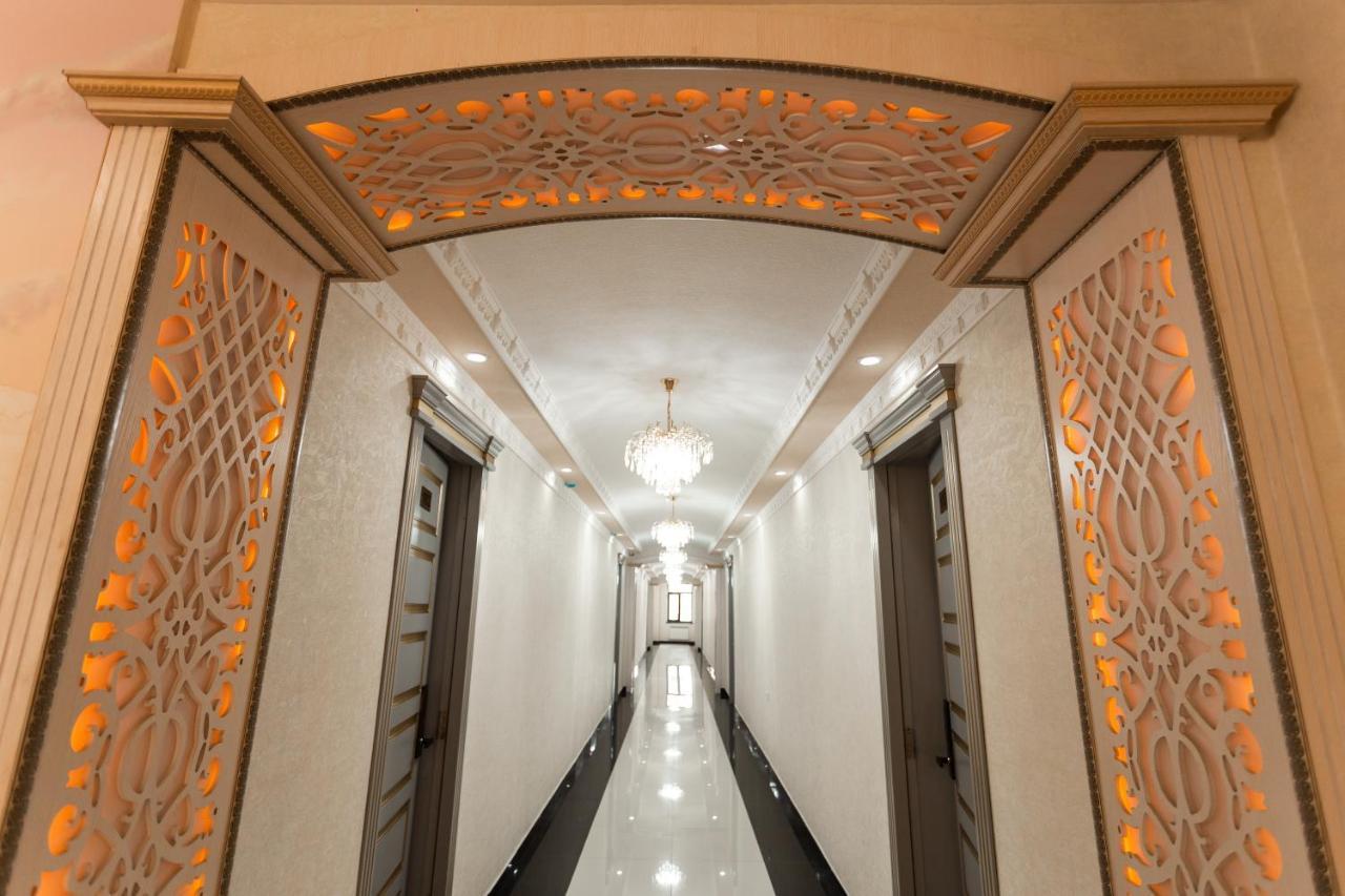 Diyor Hotel Marghilon Bagian luar foto