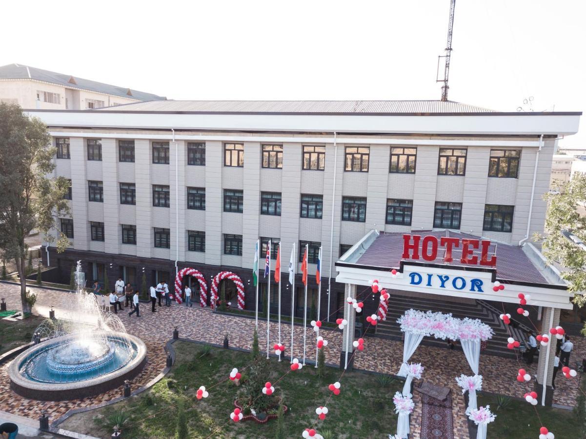Diyor Hotel Marghilon Bagian luar foto