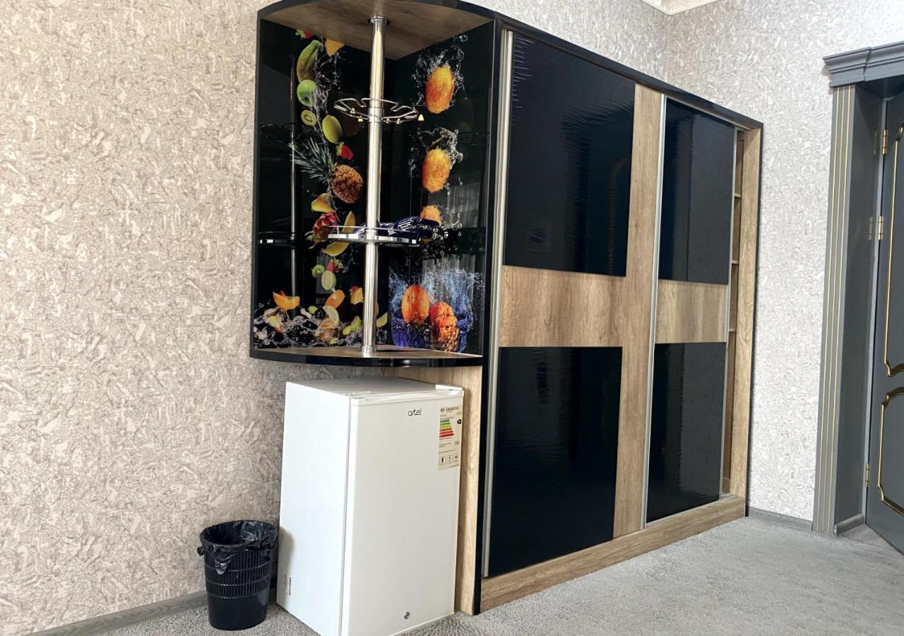 Diyor Hotel Marghilon Bagian luar foto