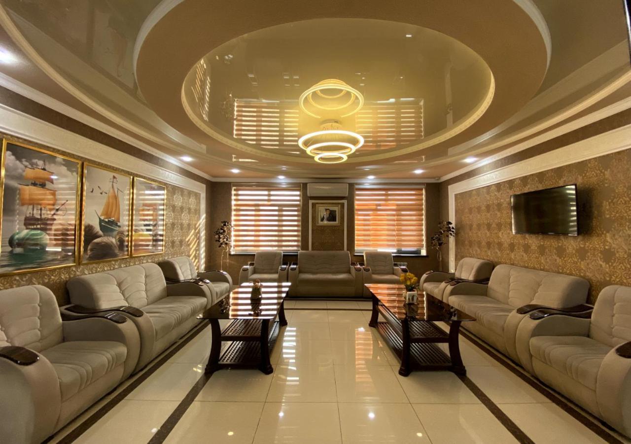 Diyor Hotel Marghilon Bagian luar foto
