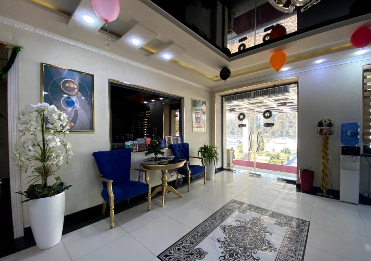 Diyor Hotel Marghilon Bagian luar foto