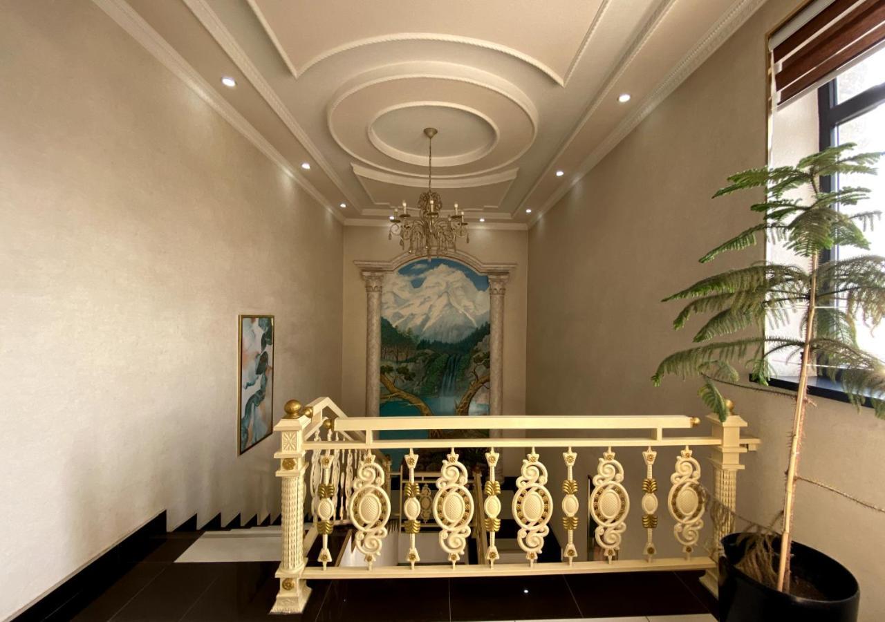 Diyor Hotel Marghilon Bagian luar foto