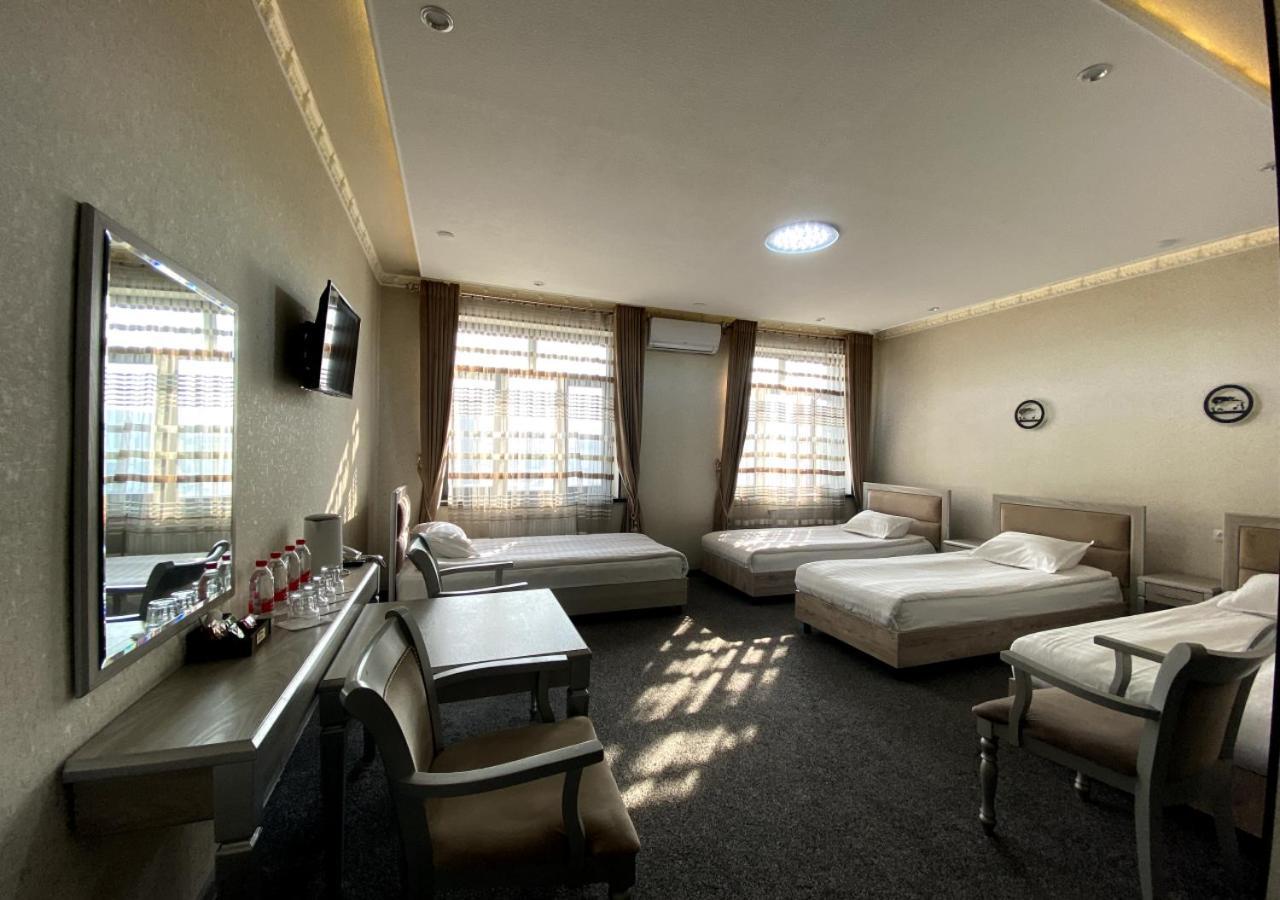 Diyor Hotel Marghilon Bagian luar foto