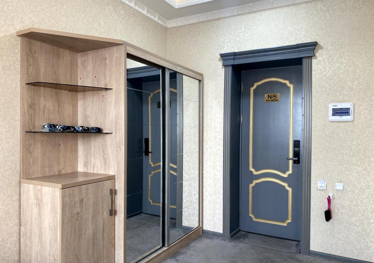 Diyor Hotel Marghilon Bagian luar foto