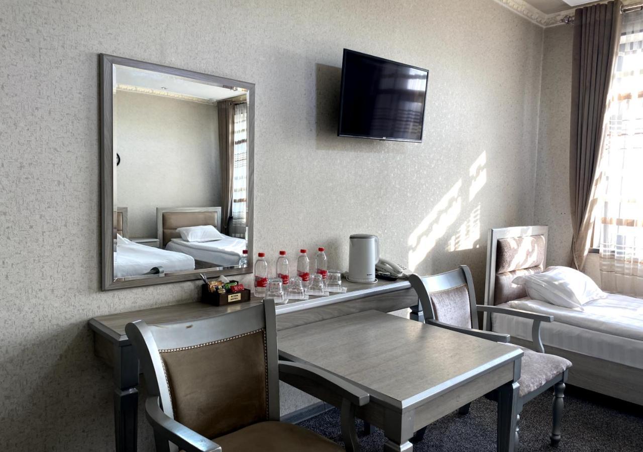 Diyor Hotel Marghilon Bagian luar foto