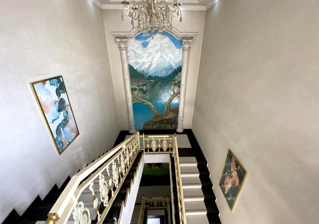 Diyor Hotel Marghilon Bagian luar foto