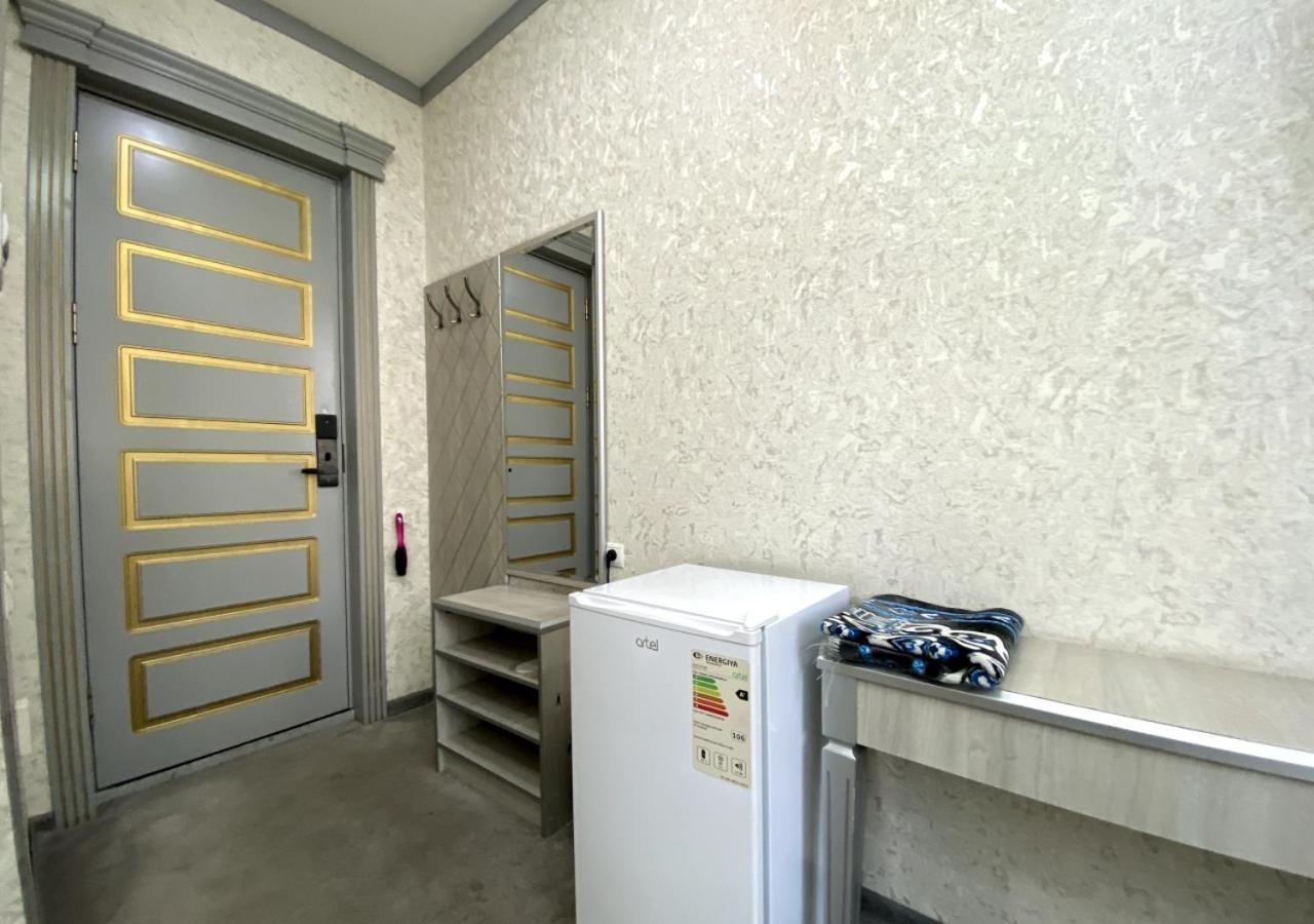 Diyor Hotel Marghilon Bagian luar foto