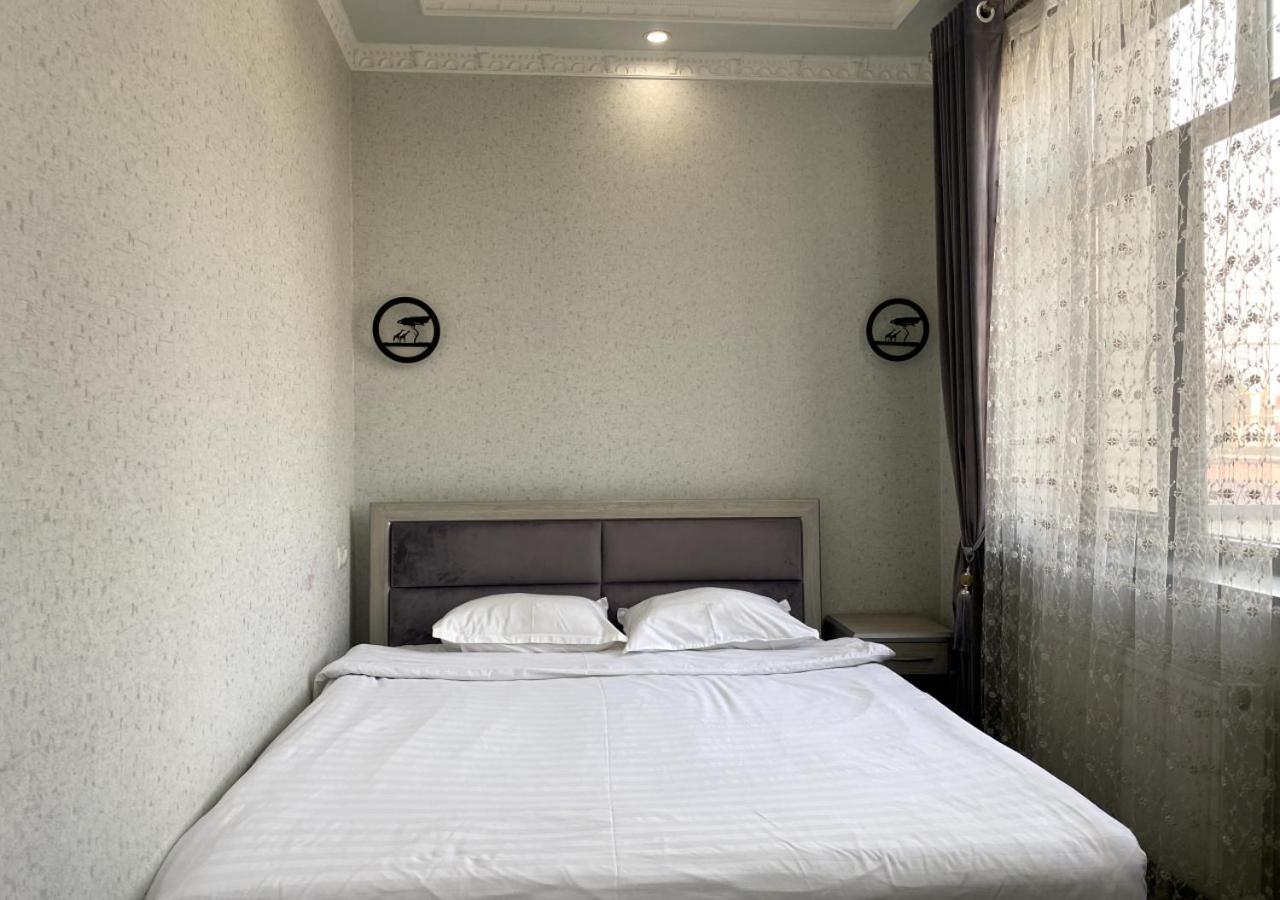 Diyor Hotel Marghilon Bagian luar foto