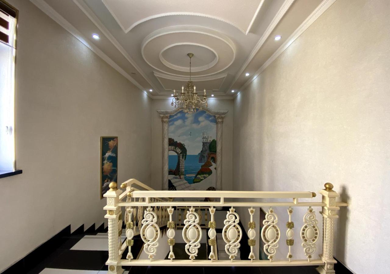 Diyor Hotel Marghilon Bagian luar foto