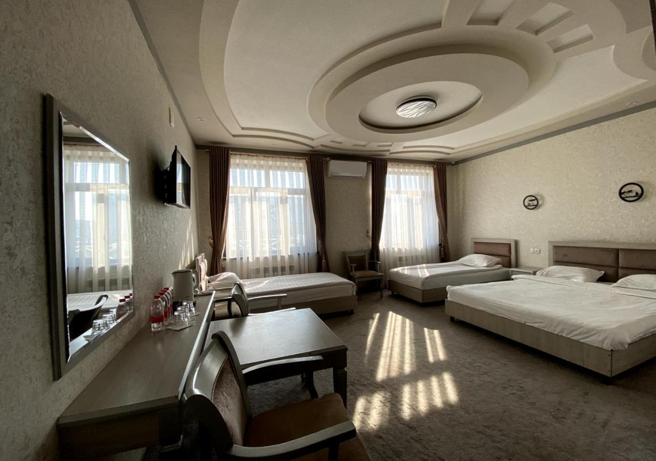 Diyor Hotel Marghilon Bagian luar foto