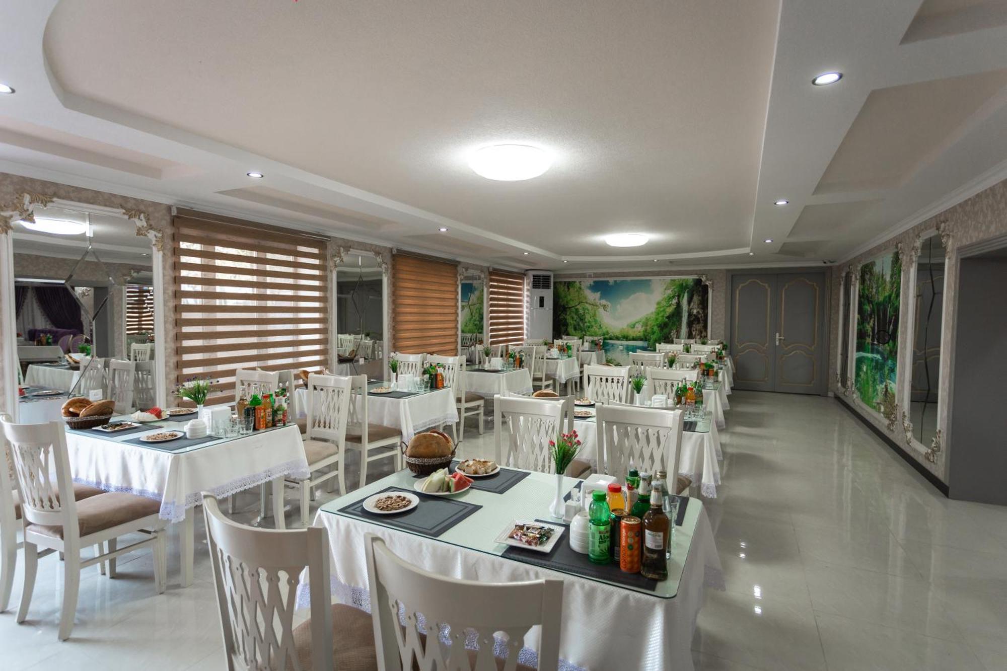 Diyor Hotel Marghilon Bagian luar foto