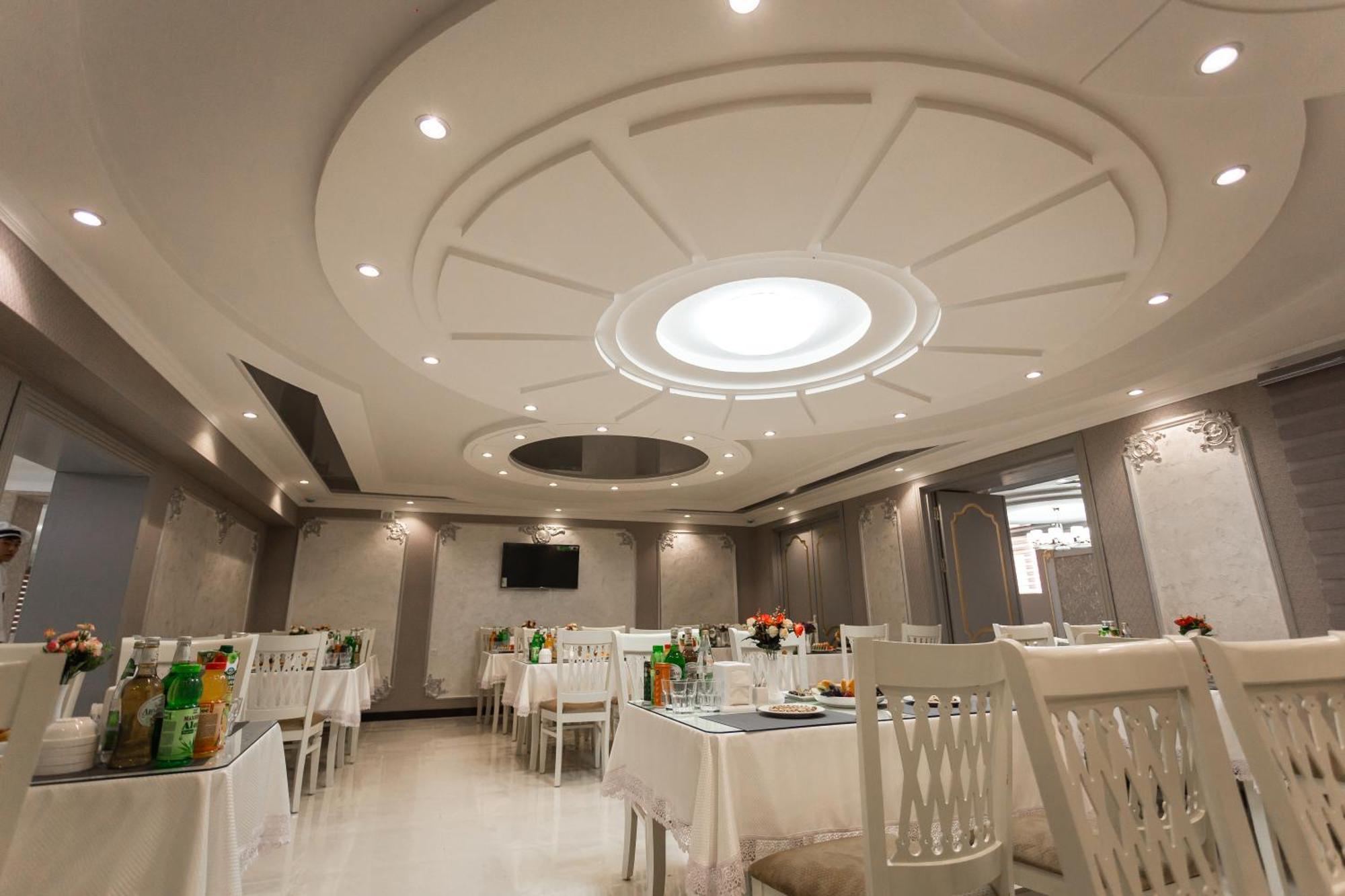 Diyor Hotel Marghilon Bagian luar foto