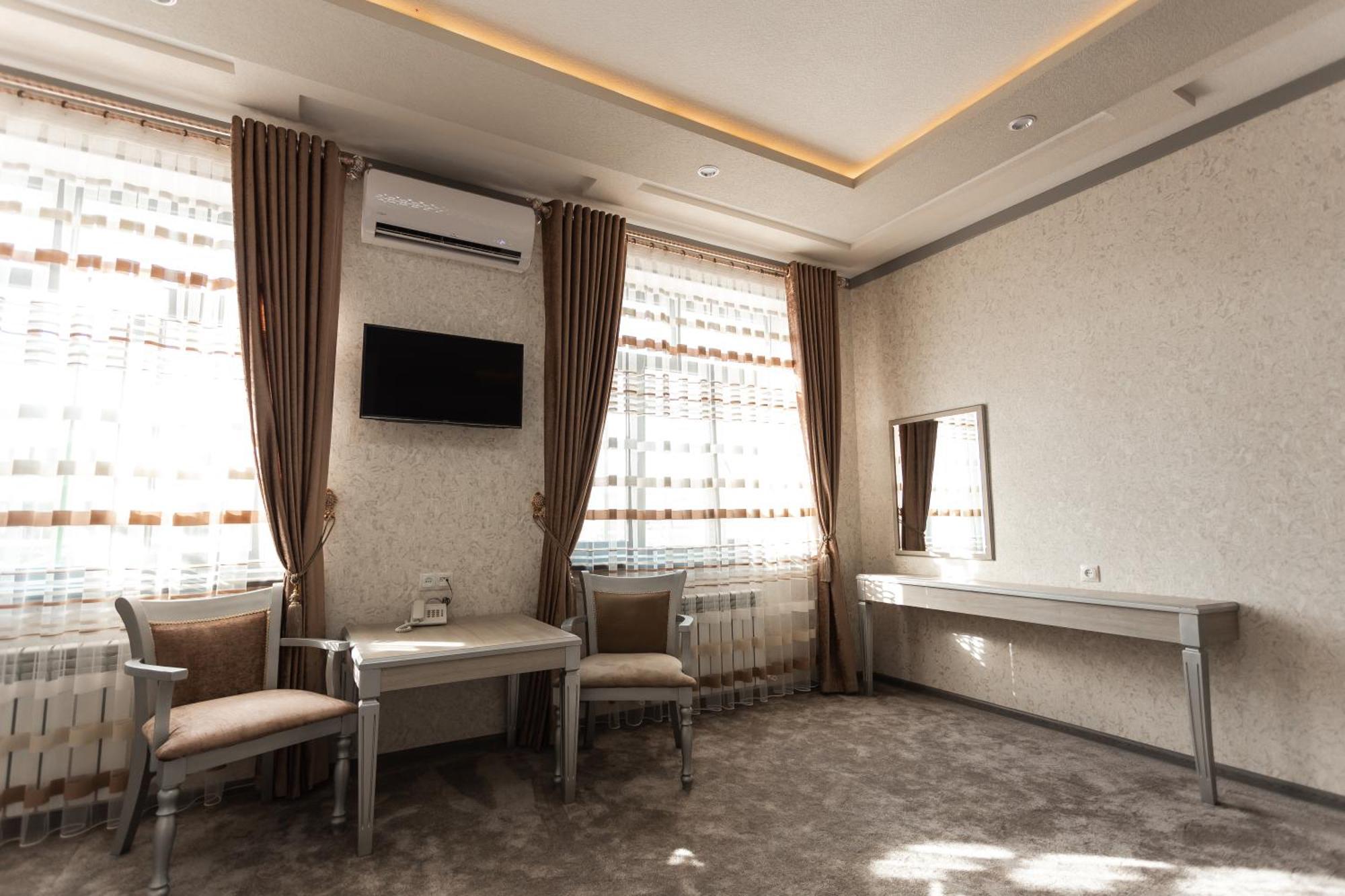 Diyor Hotel Marghilon Bagian luar foto